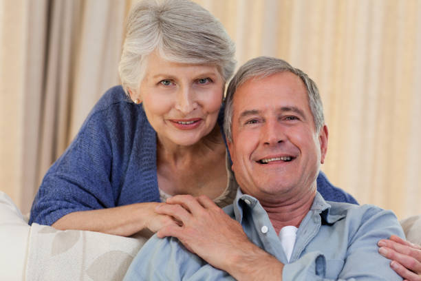 istock Woman hugging her husband 825899456