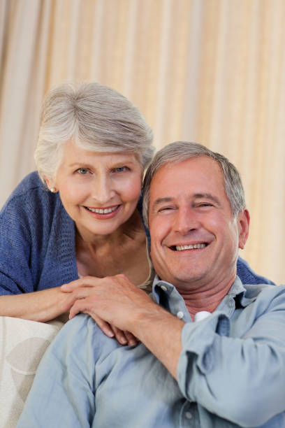 istock Woman hugging her husband 825899534