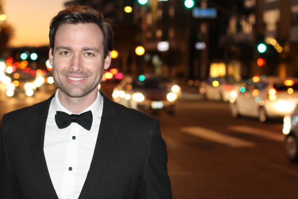 istock Gorgeous Elegant Man Walking in the City 825901004