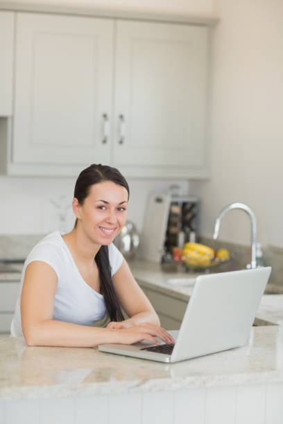 istock Young woman working on the laptop 825909316