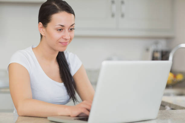 istock Young woman using the laptop 825910632