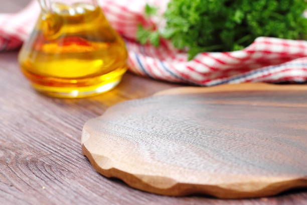 istock Wooden chopping board as a background 825917500