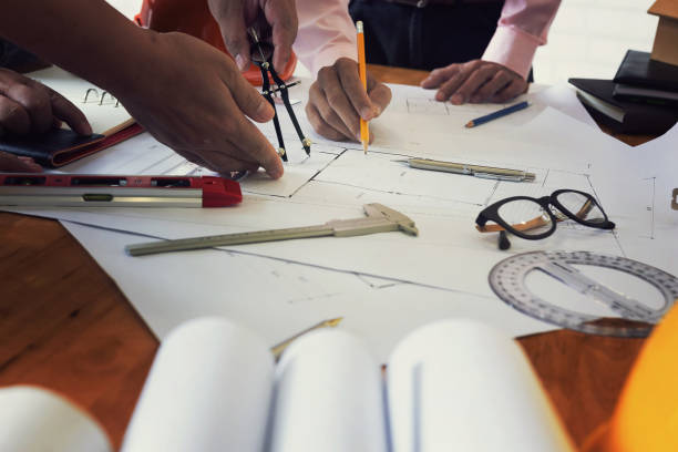 istock Team of engineers working together. 825918608