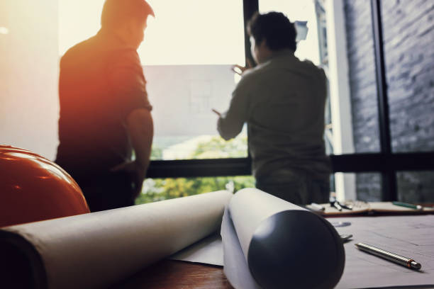 istock Team of engineers working together. 825918610
