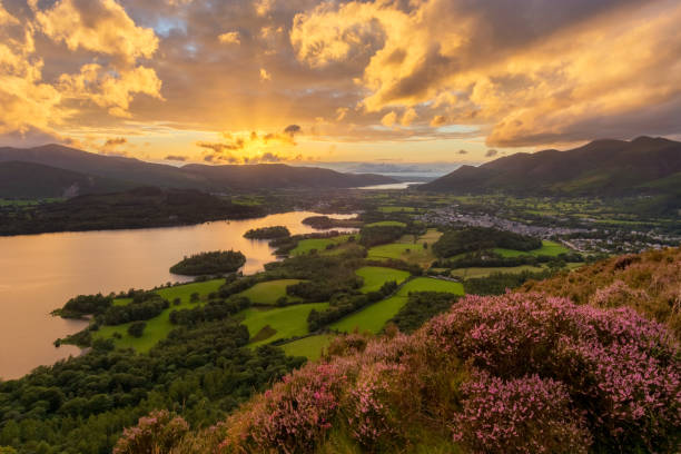 Moody Sunset Over Derwentwater In Lake District. Beautiful sunset with dramatic clouds overlooking Derwentwater in the English Lake District. keswick photos stock pictures, royalty-free photos & images