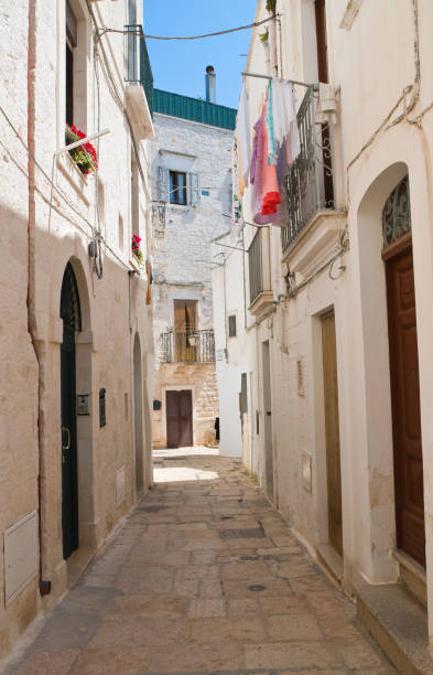 istock Alleyway. Cisternino. Puglia. Italy. 825925162