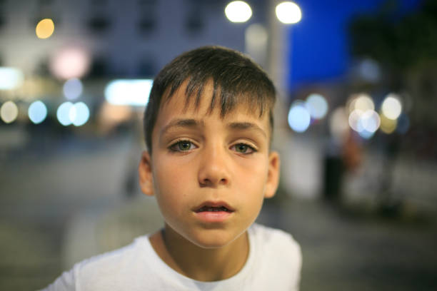 green eyes boy looking at the camera