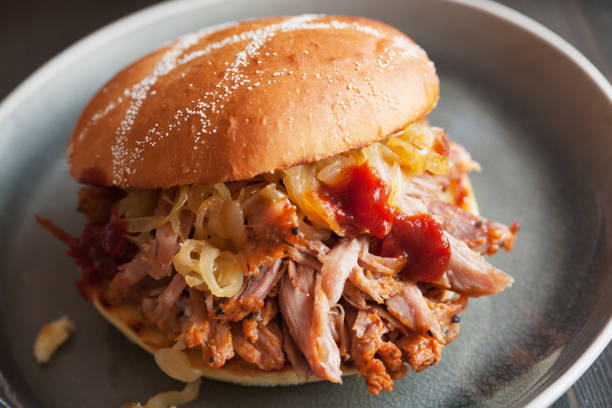 istock homemade pulled pork burger with caramelized onion and bbq sauce 825934522