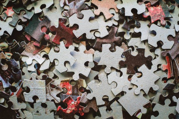 istock Pieces of jigsaw puzzle 825944362