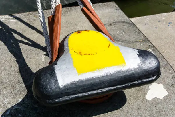 black bollard of a boat on a sail ship for rope
