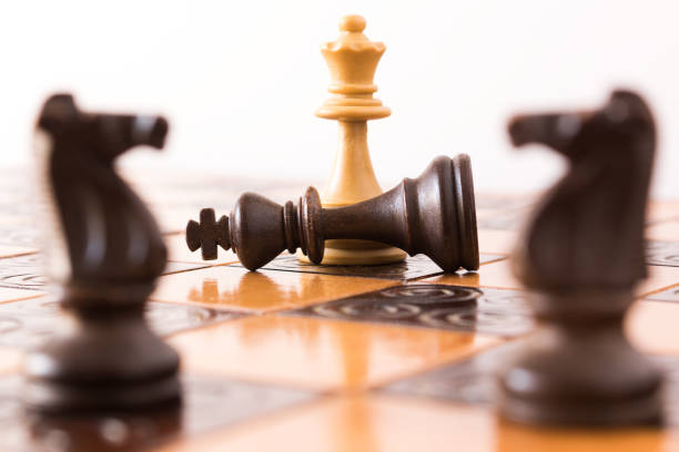 istock Chess photographed on a chessboard 825948156