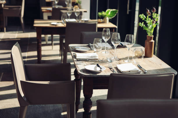 istock table in a restaurant in the sun 825948818