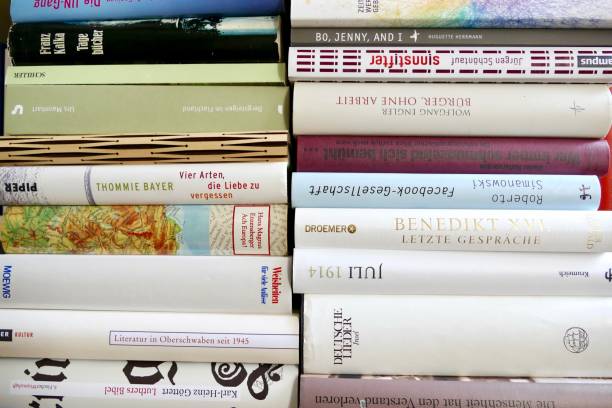 istock Row of books in the library, close up 825949272
