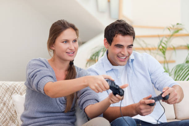 istock Couple playing video games 825954050