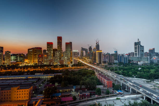 istock High angle view of Beijing Skyline, Night to Day Transition 825954326