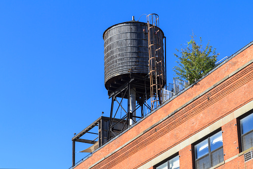 Rooftop water tank in Manhattan, New York, USA