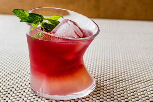 istock Malibu Sunset Cocktail with mint leaves. 825955046