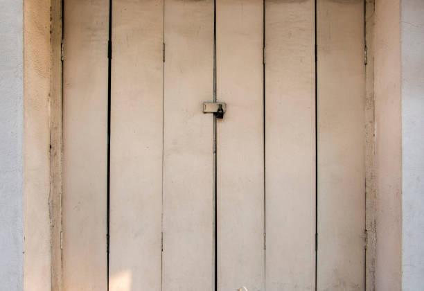 istock Old Wood Doors and Key lock photo 825955054