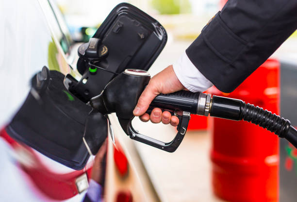 istock refueling at the gas station 825958206