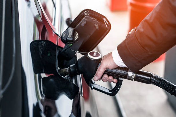 istock refueling at the gas station 825958264