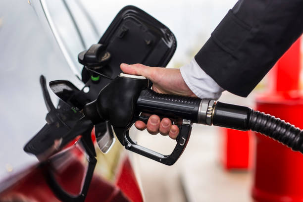 istock refueling at the gas station 825960880