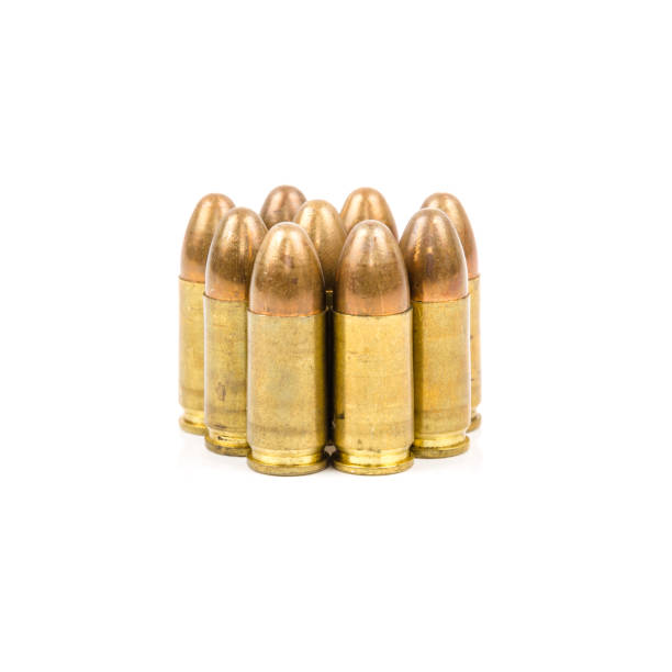 istock Gun and Bullets isolated on the white Background. 825964498