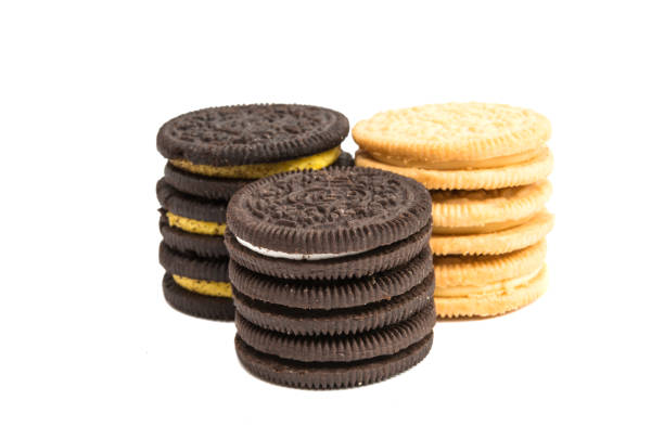 istock Chocolate cookies with cream filling isolated 825965990