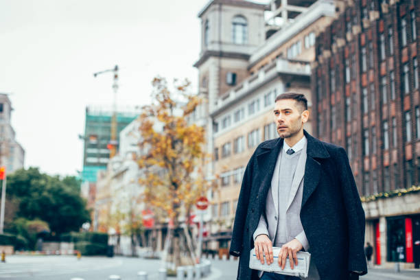istock Handsome man in city 825966164