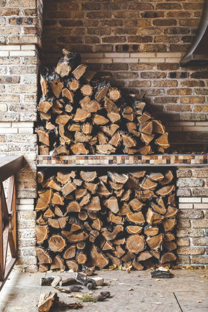 istock Chopped firewood stacked on porch 825968450