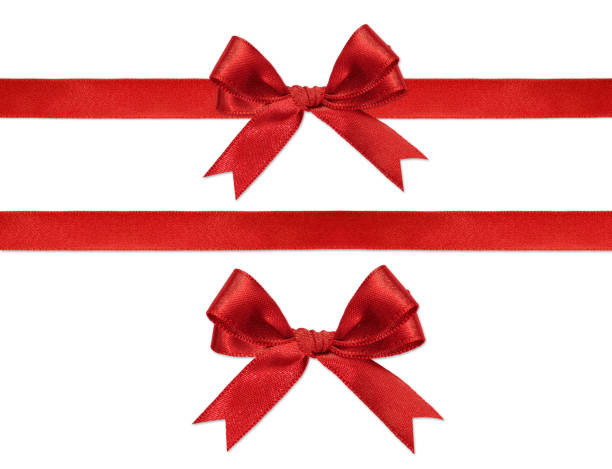 istock Shiny red satin ribbon on white background 825969058