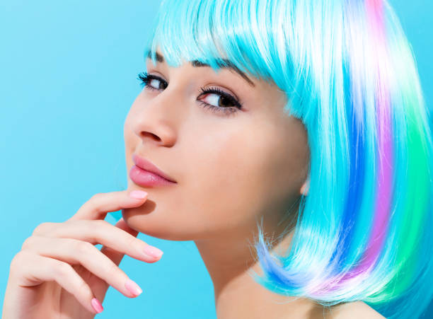 istock Beautiful woman in a bright blue wig 825972430