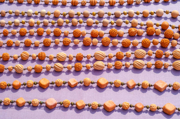Texture, background. bijouterie, imitation jewelry. jewelry or trinkets. Women's jewelry made of precious metals and stones