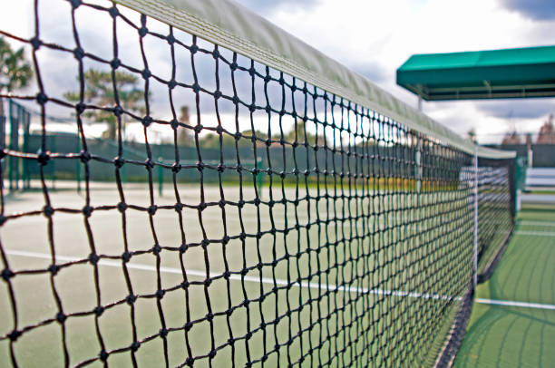 istock Tennis court net close-up 825977422