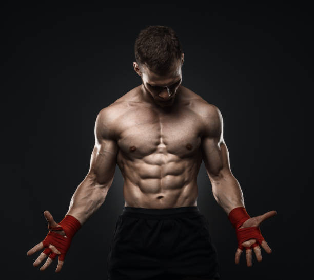 istock MMA Fighter Preparing Bandages For Training. 825978908