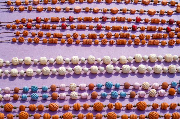 Texture, background. bijouterie, imitation jewelry. jewelry or trinkets. Women's jewelry made of precious metals and stones