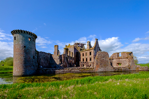 Caerlaverock Castle is a triangular castle dating back to the 13th century, located in the southern coast of Scotland. Demolished and rebuilt several times over the centuries, today the castle is in the care of Historic Scotland and is a popular tourist attraction.