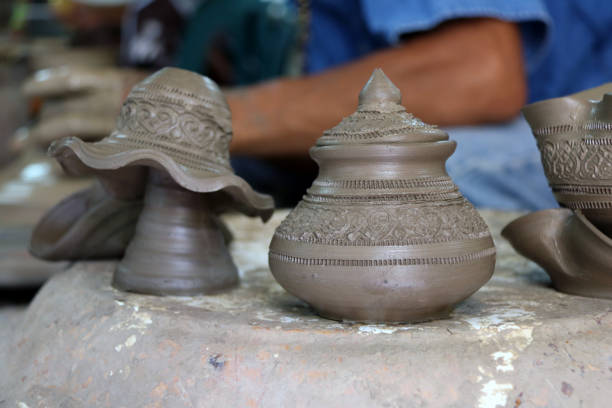 Small raw pottery before burn in the kiln, in Nonthaburi Thailand. stock photo