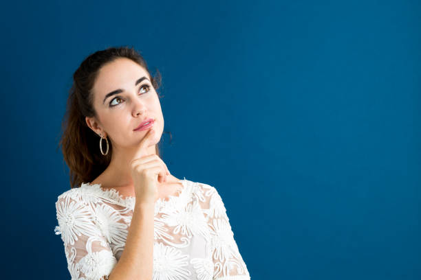 istock Young woman in a thoughtful pose 825989438