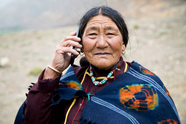Portrait of elderly woman talking on mobile phone