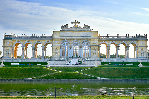 Vienna, Austria - September 25, 2013: Schonbrunn Palace and gardens. The former imperial summer residence. The palace is one of the most important architectural, cultural, and historical monuments in the country.