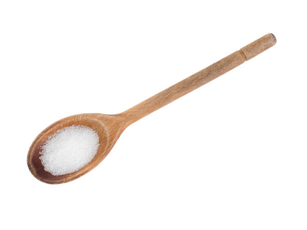 istock Fructose on wooden spoon, sugar substitute, replacement. 826001346