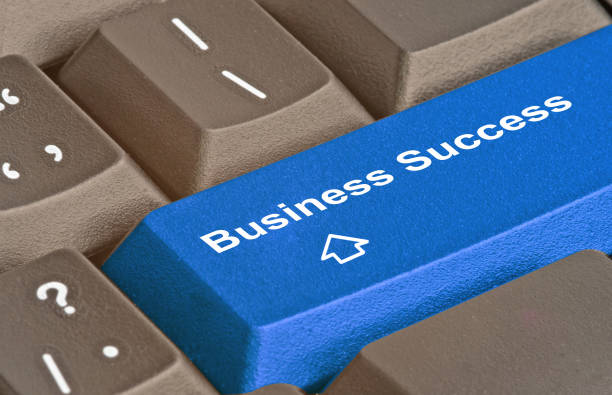 istock Keyboard with key for business success 826005660