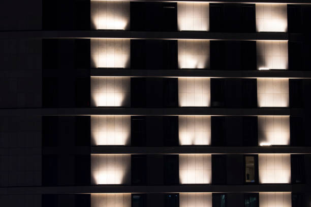 istock View of facade of a modern building at night. 826014986