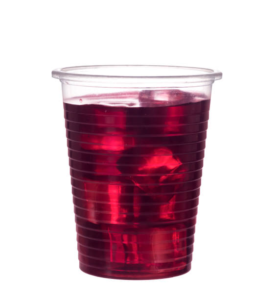 istock Red berry fruit drink in plastic cup, isolated on white. With ice. 826016036