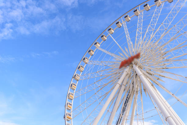 istock Ferris wheel in amusement park 826018908