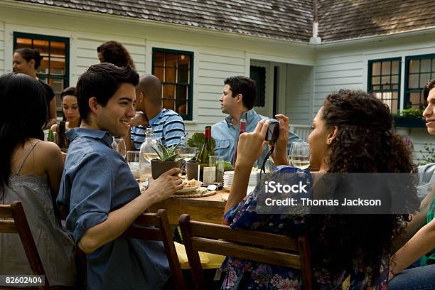 Hispanics At Outdoor Garden Party At Country Home Stock Photo - Download Image Now - Dining, Friendship, Yard - Grounds