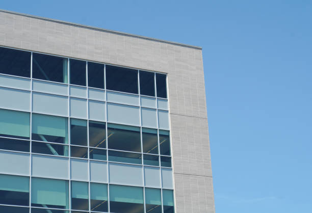 istock business building corporate office corner white brick and windows 826026546