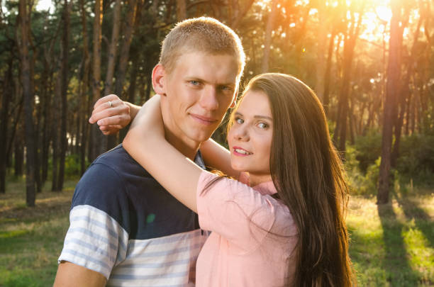 istock Loving Couple hugging each other outdoors at sunset 826041242