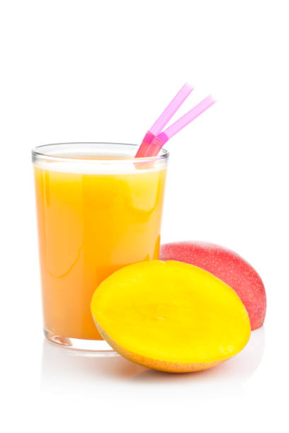istock Mango juice glass isolated on white background 826043790