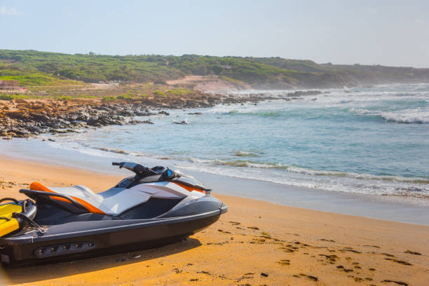 istock Jet ski on the sand in Porto Ferro shore 826043920